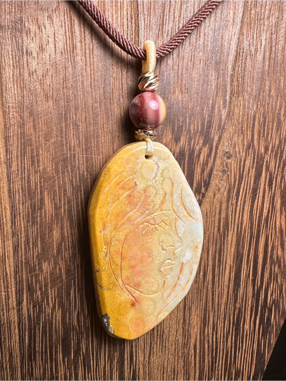 Coral Fossil Lady Profile Pendant Necklace on Brown Rope - Picture 4 of 14